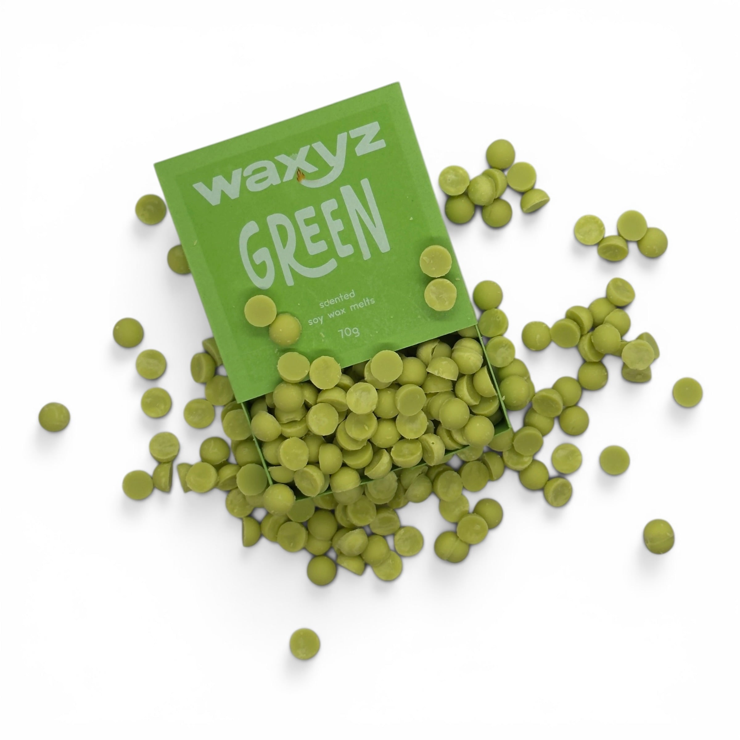 Green wax melts spilling out of a 'waxyz' green packaging on a white background